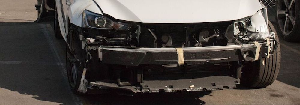 Lexus with damaged bumper
